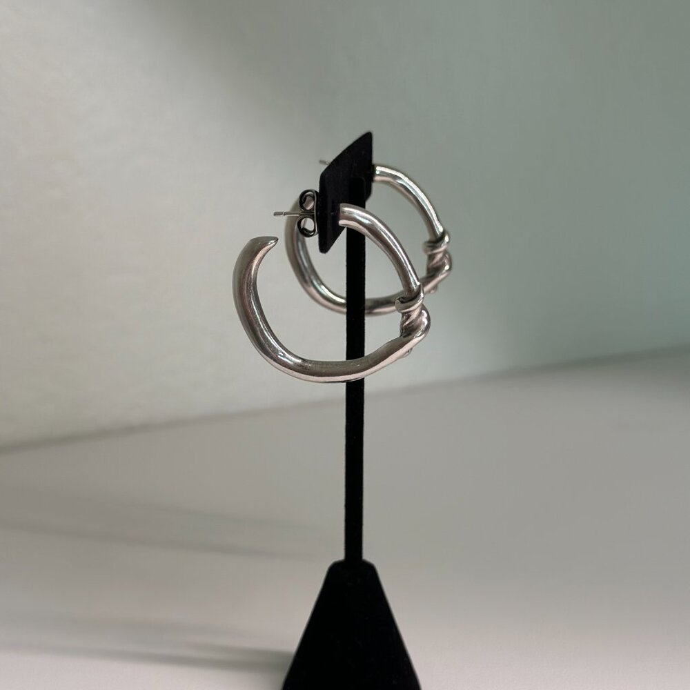 UNO de 50 Twisted Silver Hoop Earrings
